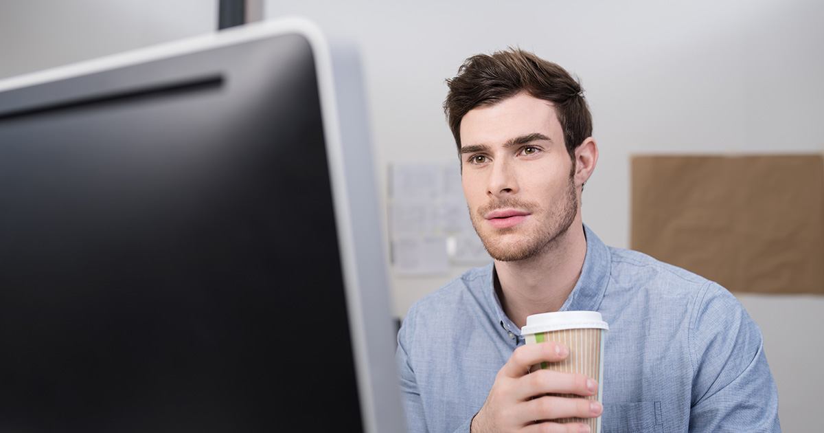 intern, piss, computer, white guy, facial hair, short hair, blue shirt, latte, cup, starbucks, coffee