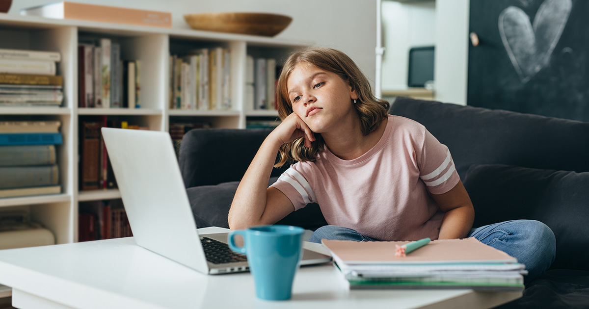 girl, cup, drink, blue, bored, computer, game, young, pink shirt, shelf, book case, macbook, chess, play, slouch