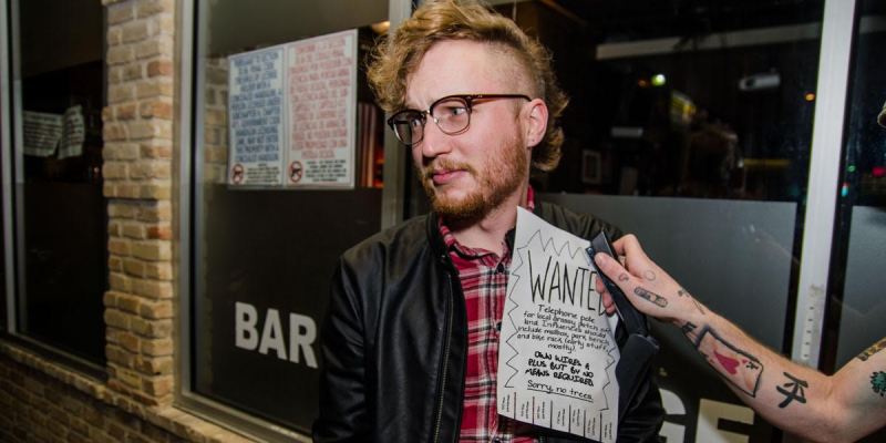 telephone, pole, flyer, bassist