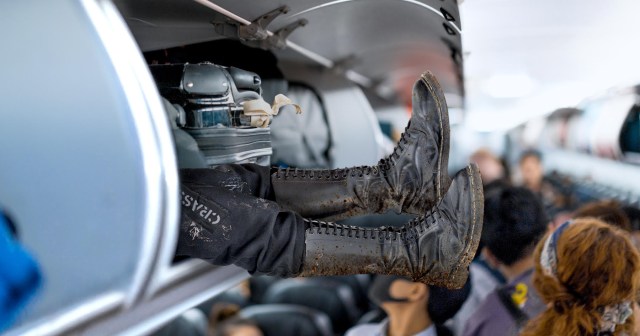 Crust Punk Dead After Being Forced to Ride in Overhead Compartment