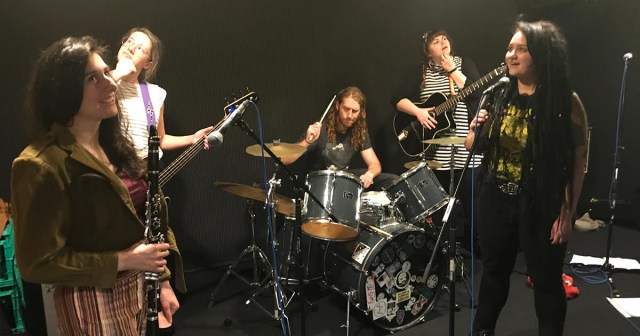 Band at Rehearsal Space Realizes New Song’s Been Missing 10 Metal Bands Playing Simultaneously in All Directions