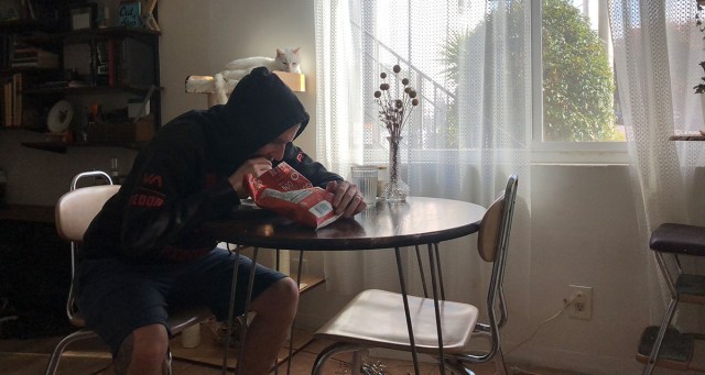 Youngest of Six Still Eats with Arm Around Plate Like Hardened Prisoner
