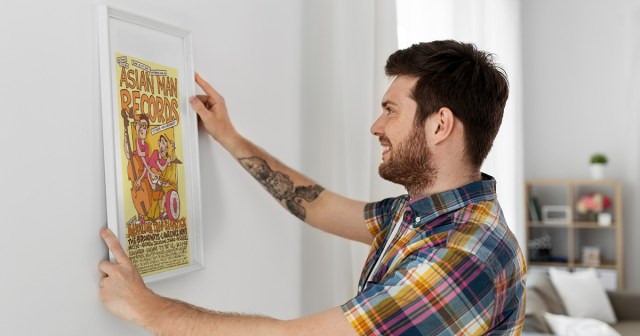 Report: Punk with Poster in Frame Must Be Doing Pretty Well for Himself