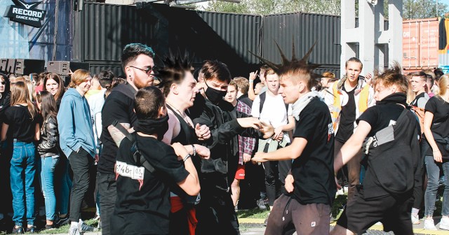Two Fully Grown Male Punks Ram Spiked Heads in Pit to Impress Potential Mate