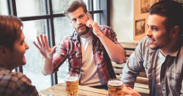 Gross! This Guy is Making a Phone Call on His Portable Porno Player