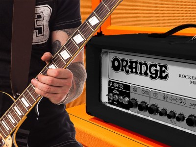 shy, black, orange amp