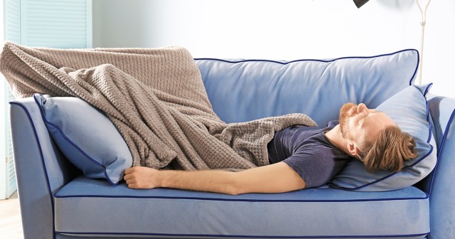 Man Gets Out of Bed to Take Nap on Couch