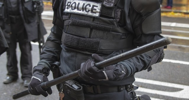 Protester Dies of Natural Causes After Repeatedly Attacking Police Baton With Face