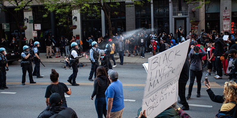 white, pepper spray, cop