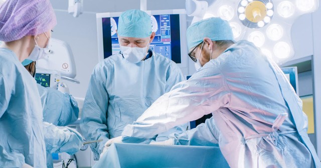 Pussy-Ass Doctor Wears Mask During Surgery