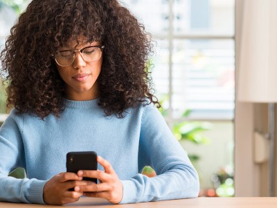 black woman, phone, friends