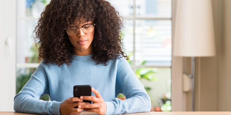 black woman, phone, friends