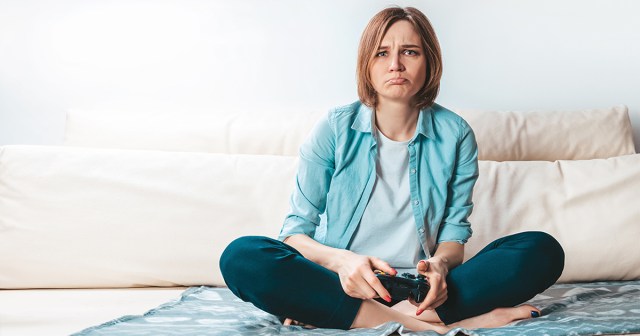 Gamer Spoilt for Choice Between Game She’s Tired Of and Podcast She Hates