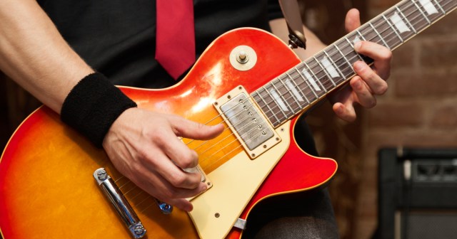 The True Story of How Les Paul Accidentally Invented His World Famous Guitar While Crafting a Bludgeoning Device for Beating Irish Immigrants