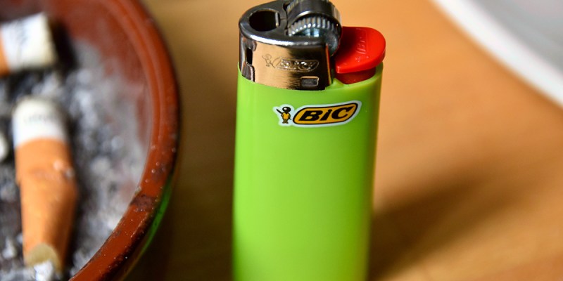 bic lighter, fire, green, plastic, homeless