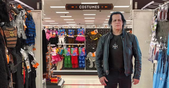 Apologetic Caretaker Removes Muttering Danzig from Party City