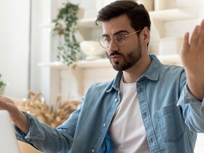 confused, frustrated, blue shirt, glasses, man, 30, old, child, immature, beard