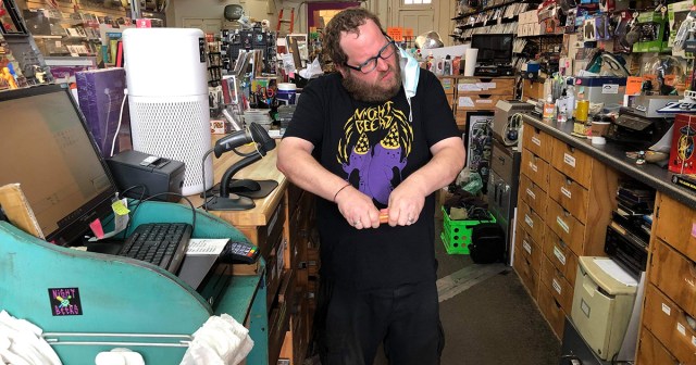 All of Cashier’s Frustrations Channeled Into Breaking Open Roll of Quarters