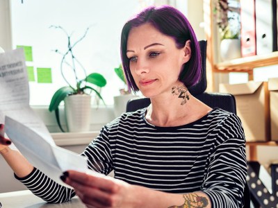purple hair, stripes, shirt, black and white, tattoo, neck tattoo, woman, credit score, paper