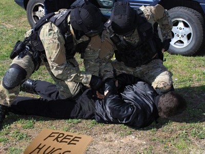 cops, police, military police, camo, free hugs, creepy, guy, violence, protest