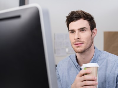 intern, piss, computer, white guy, facial hair, short hair, blue shirt, latte, cup, starbucks, coffee
