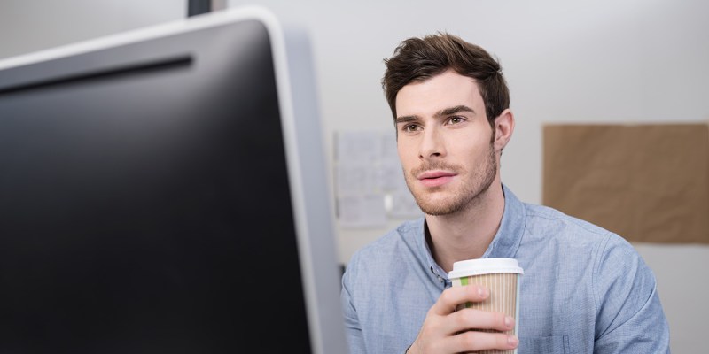 intern, piss, computer, white guy, facial hair, short hair, blue shirt, latte, cup, starbucks, coffee
