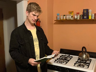 racist, family recipe, book, orange, kitchen, punk, black jacket, cool, stove, range