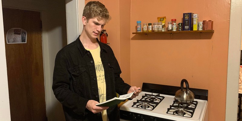 racist, family recipe, book, orange, kitchen, punk, black jacket, cool, stove, range