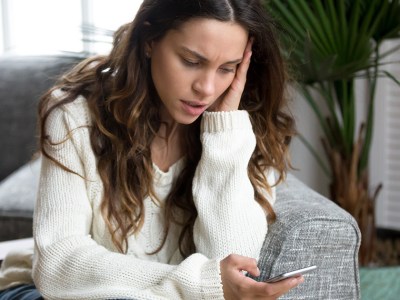 woman, sweater, hair, brunette, white, phone, email, amp, guitar, nervous