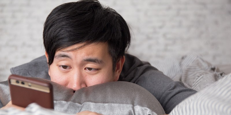 man, ready, white wall, bricks, pillow, hair, black, phone, text, call, weirdo, commitment