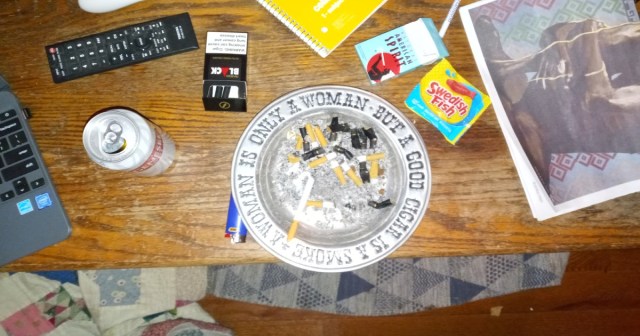 Punk House Ashtray Rotated to Less Full Side for Company