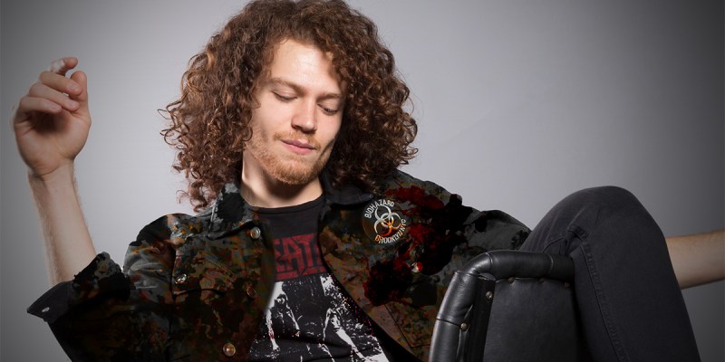 biohazard, smell, gross, vile, long hair, curly, unkept, black, denim, punk jacket, patch, sew, dirty