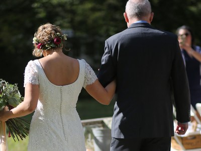 dress, white, open back, flowers, father, aisle, walk, sunny, outside, skin tone, light, white, blonde, suit, tie, fancy