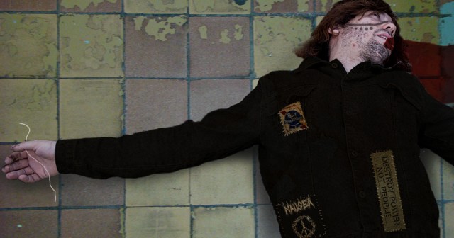 Crust Punk Bleeds Out After Flossing Teeth for First Time in 12 Years