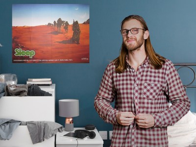 long hair, glasses, sleep poster, blue room, pot, pothead, messy, messy room, gross, disorderly, late