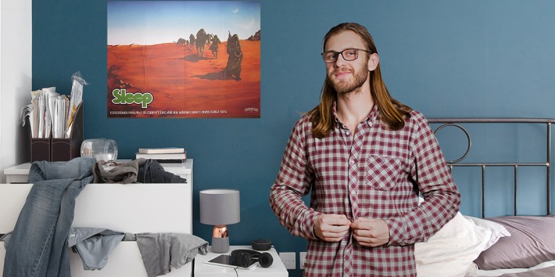 long hair, glasses, sleep poster, blue room, pot, pothead, messy, messy room, gross, disorderly, late