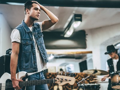 bassist, punk, stupid, dull, strings, two, extra, frets, denim jacket, tattoo, dumb, practice, rehearse, sad