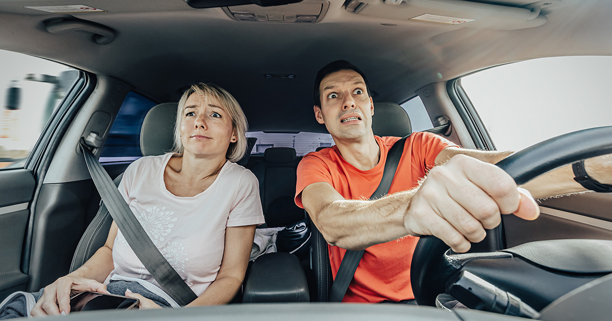 orange shirt, white shirt, man, drive, woman, passenger, scared, white knuckle, anxious, stressed, annoying, confusing, upsetting, crappy car, poor, beater, music, list, ice, ice breaker, funny, sad