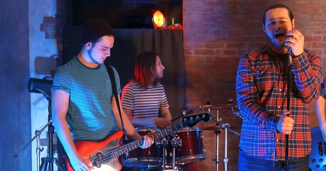 Hot Guy Playing Bass Must Really Suck at Singing