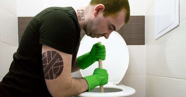 Crust Punk Somehow Clogs Toilet After Taking a Piss