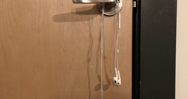 Woman Dies After Doorknob Rips Earbuds Out