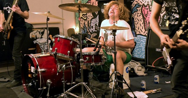 Leaky Roof Bucket Moonlighting as Drum Throne