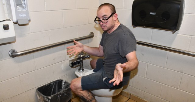 Cool Teacher Sits on Toilet Backwards
