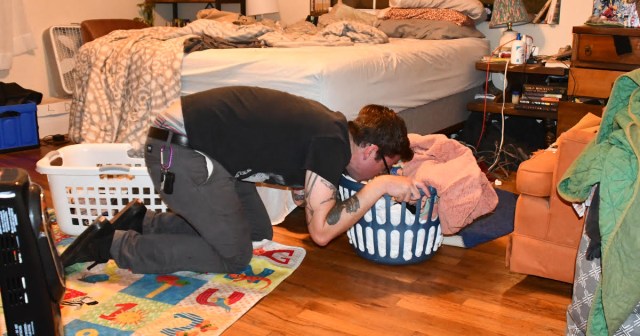 Drunk Friend Somehow Makes It Past Three Separate Locked Doors To Vomit On Stack of Freshly Laundered Clothes