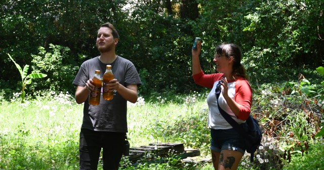 Family Attempts to Bring Lost Crust Punk Home by Shaking Pack of Cigarettes, Clinking 40 Ounce Bottles in Backyard