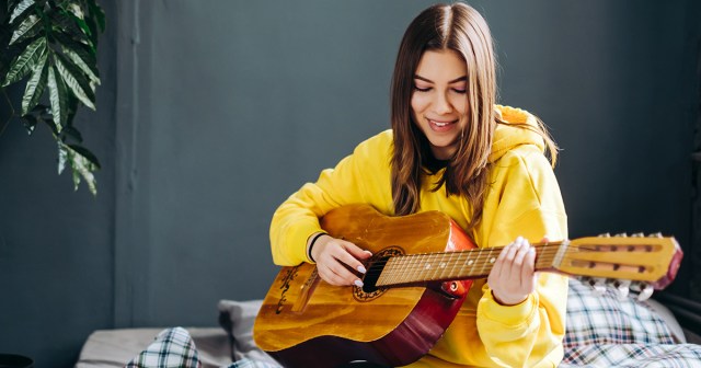 Woman Uses Freshly Plucked Chin Hair to Restring Guitar