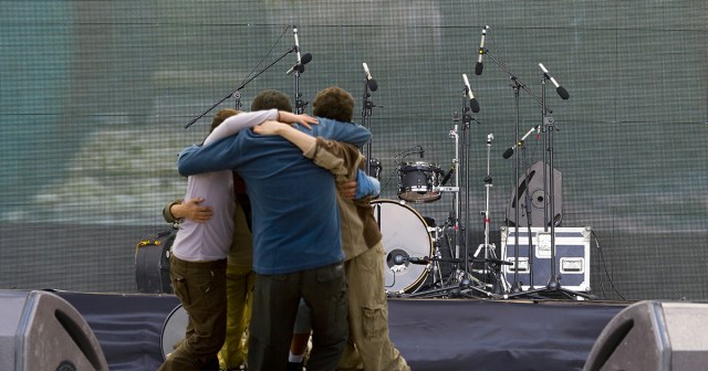 Band’s Pre-Show Huddle Mainly Just Prayer That Allegations Don’t Come Out