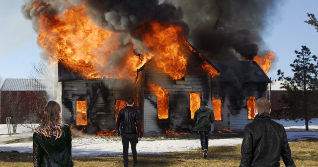 Metal Band Rushes to Take Promo Photos in Front of Burning House Before Fire Department Puts It Out