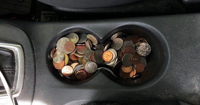 Man’s Financial Nest Egg Almost to Point of Filling Cupholder in Car’s Center Console