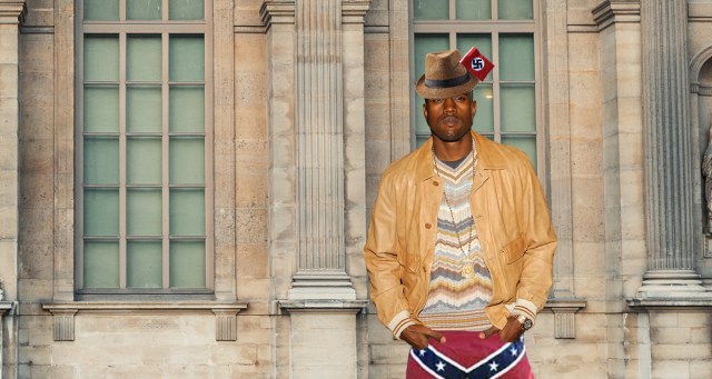Kanye West Doubles Down With Confederate Flag Jorts, Swastika Adorned Fedora